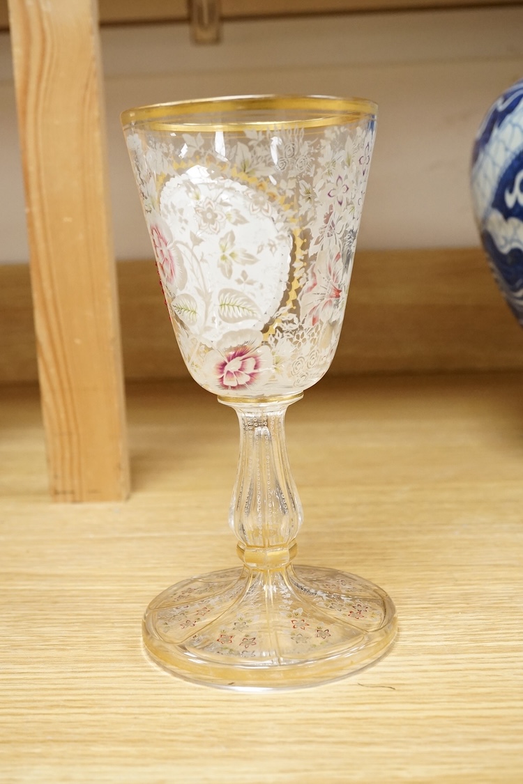 A Bohemian enamelled, overlaid and jewelled goblet, late 19th century, decorated with a Kingfisher grasping a fish, 20cm high